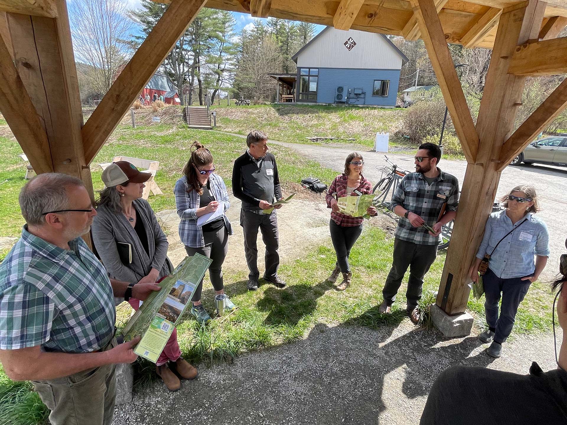 group talking in lean-to