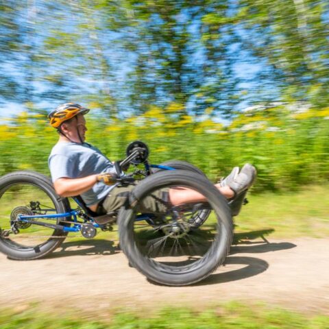 mountain biker on accessible trail