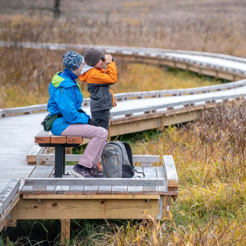 kid with binoculars