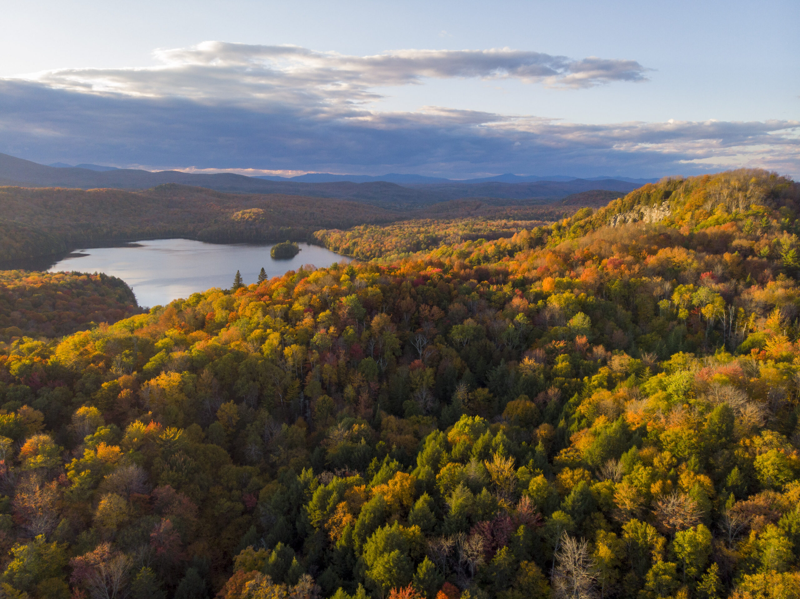 scenic shot of Vermont foliage looking down at pond from Nichols Ledge